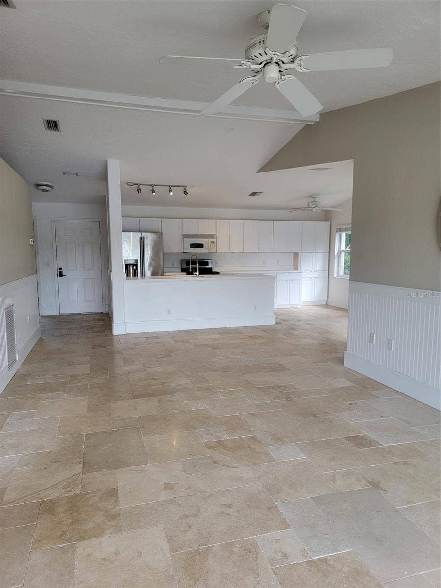 Living room to open plan kitchen