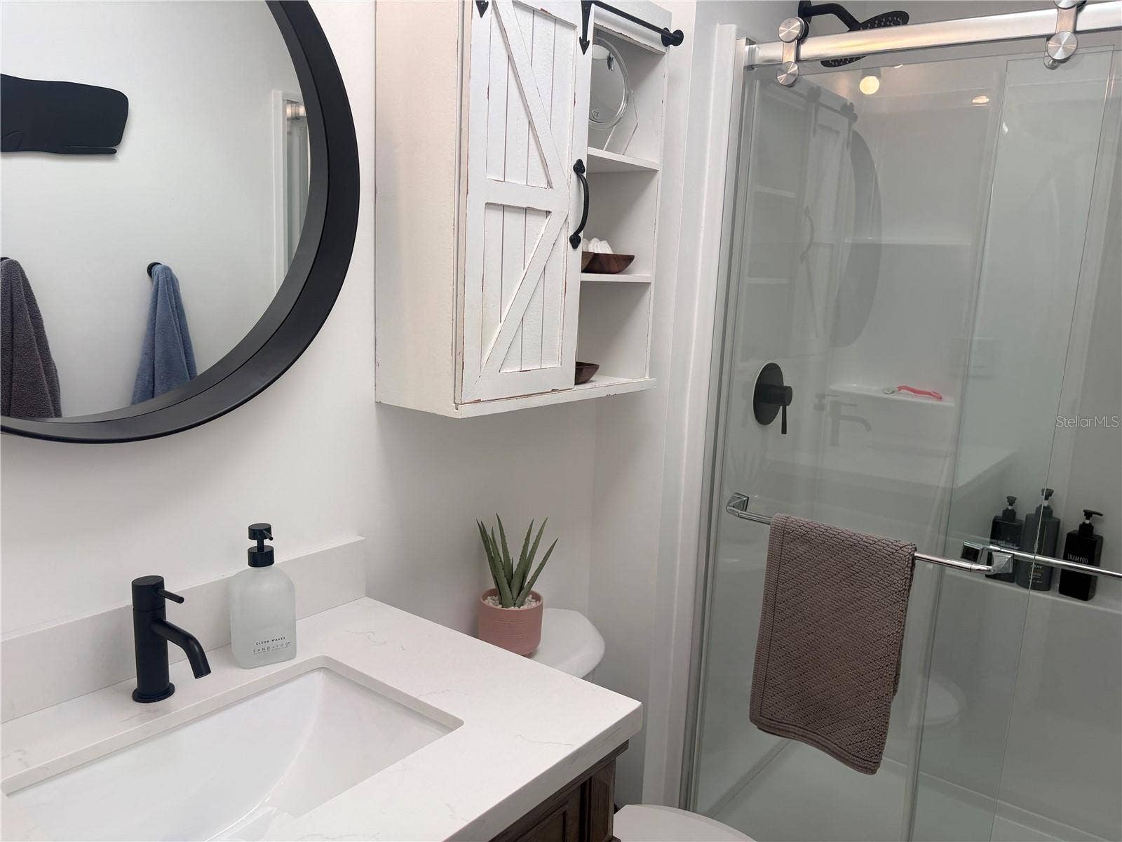 5707 45TH STREET E, #100, Bradenton, FL 34203 Guest Bathroom Tub Converted to Shower