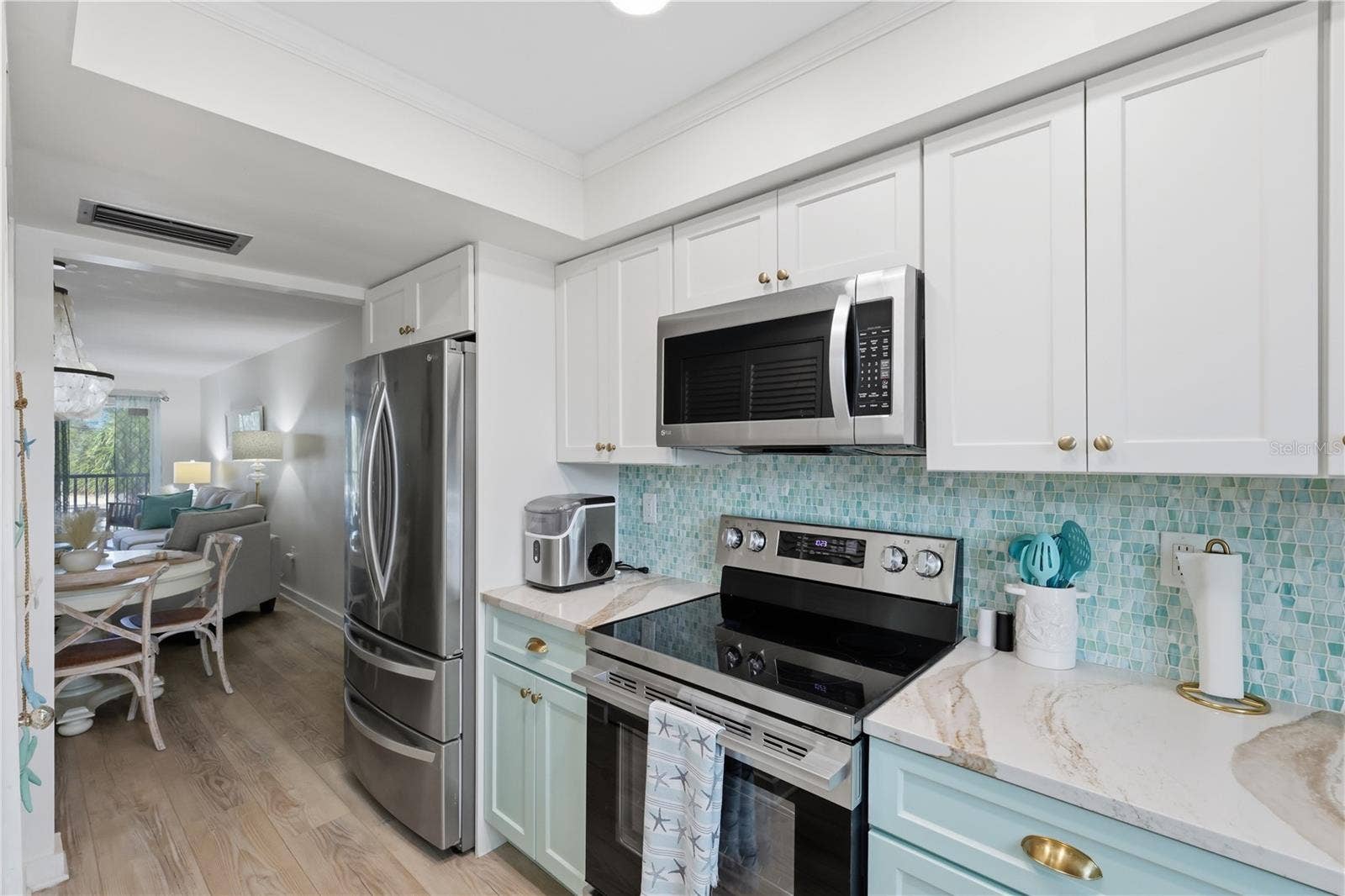 4307 GULF DRIVE, #206, Holmes Beach, FL 34217 Beautiful Stainless Appliances and Solid Countertops