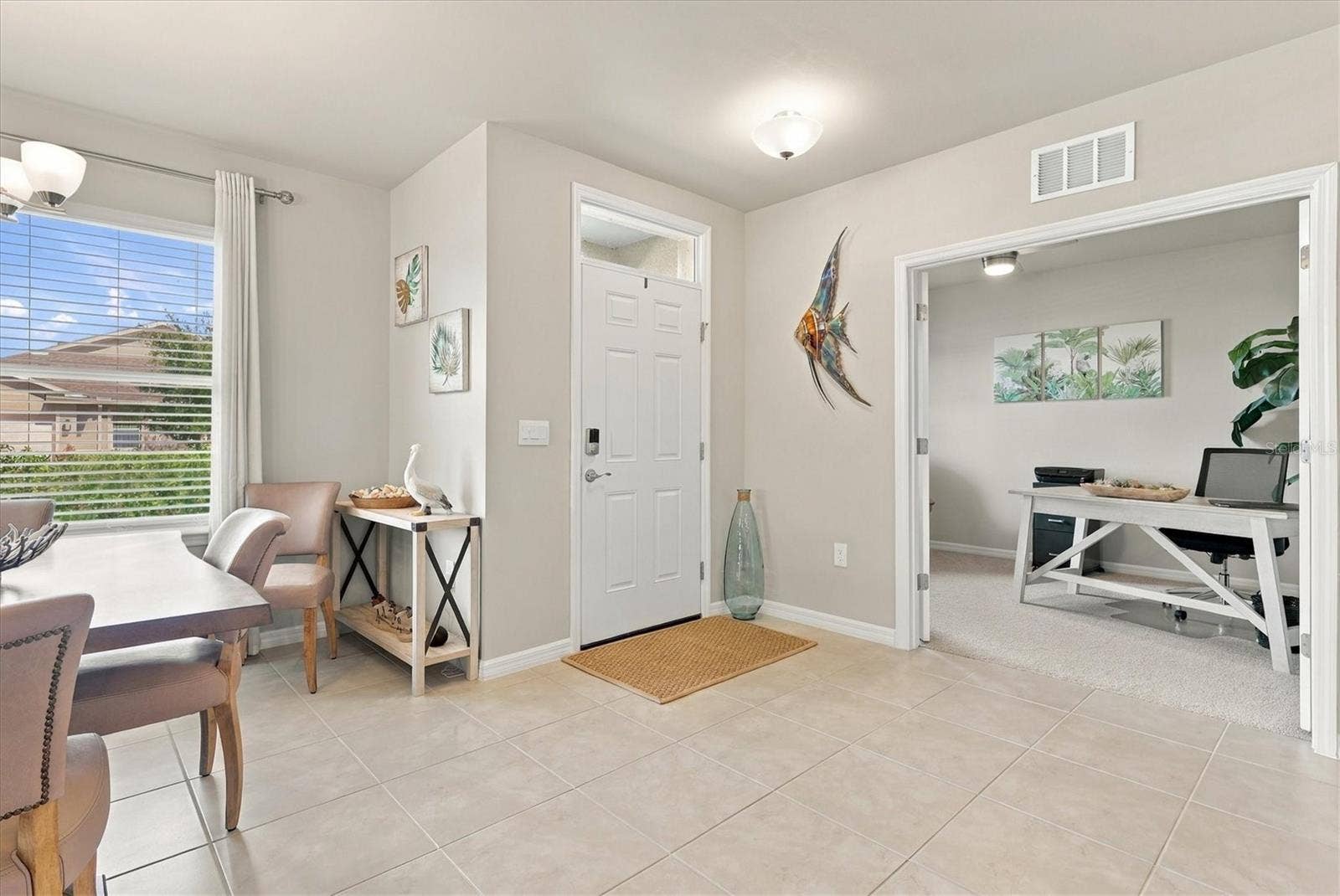 1468 REMINGTON TRACE DRIVE, Port Charlotte, FL 33953 Entry Door with Den off to the left and Dining on the right