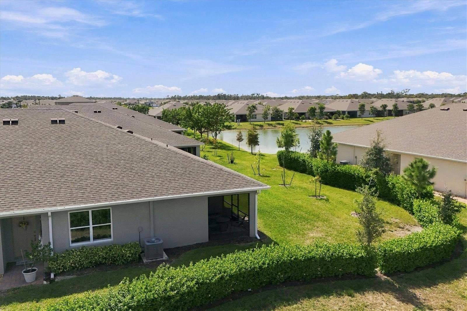 1468 REMINGTON TRACE DRIVE, Port Charlotte, FL 33953 Peek-A-Boo view from the Lanai with Large Corner Lot
