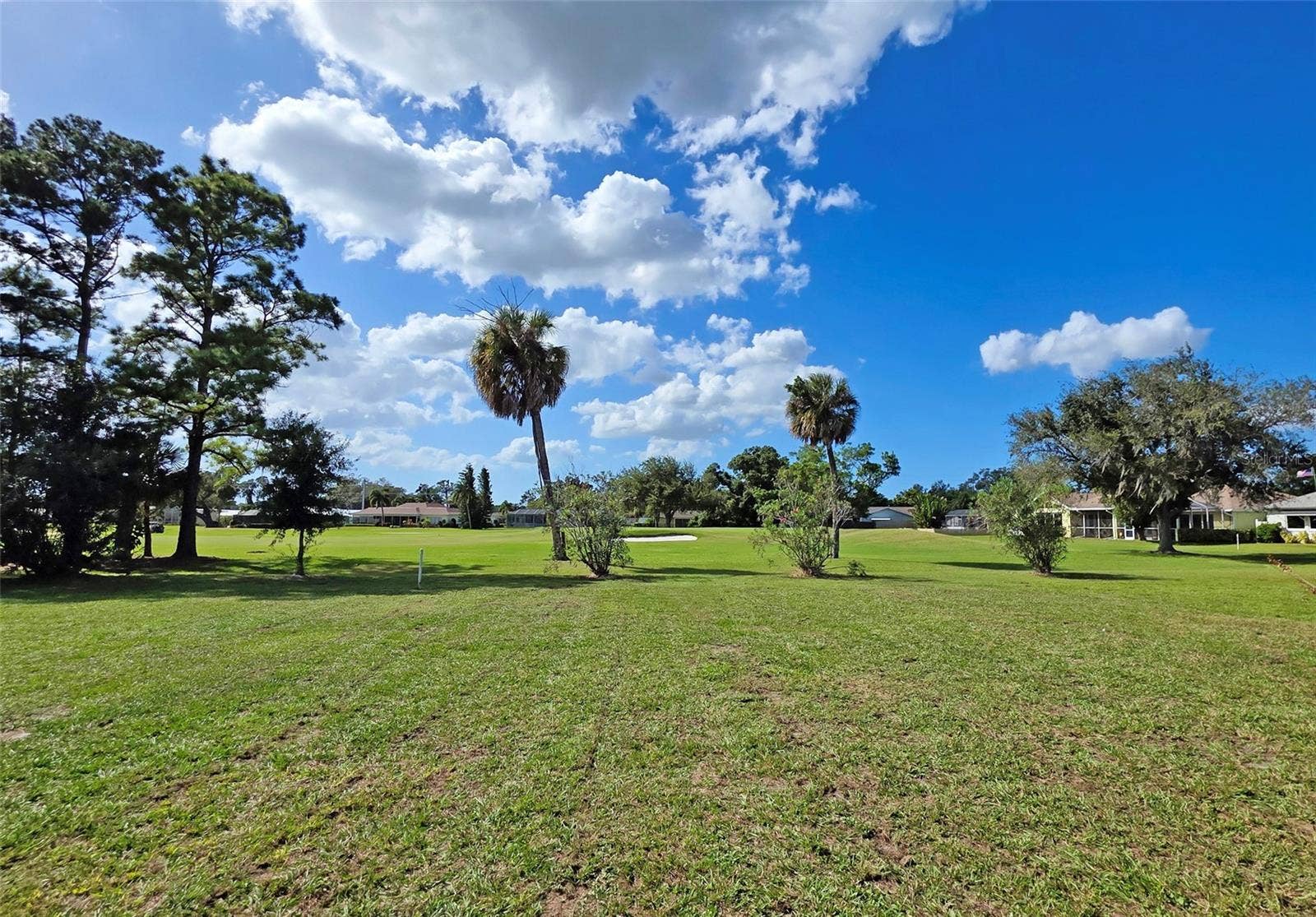 714 MAGELLAN DRIVE, Sarasota, FL 34243 Yard and Golf Course views 2
