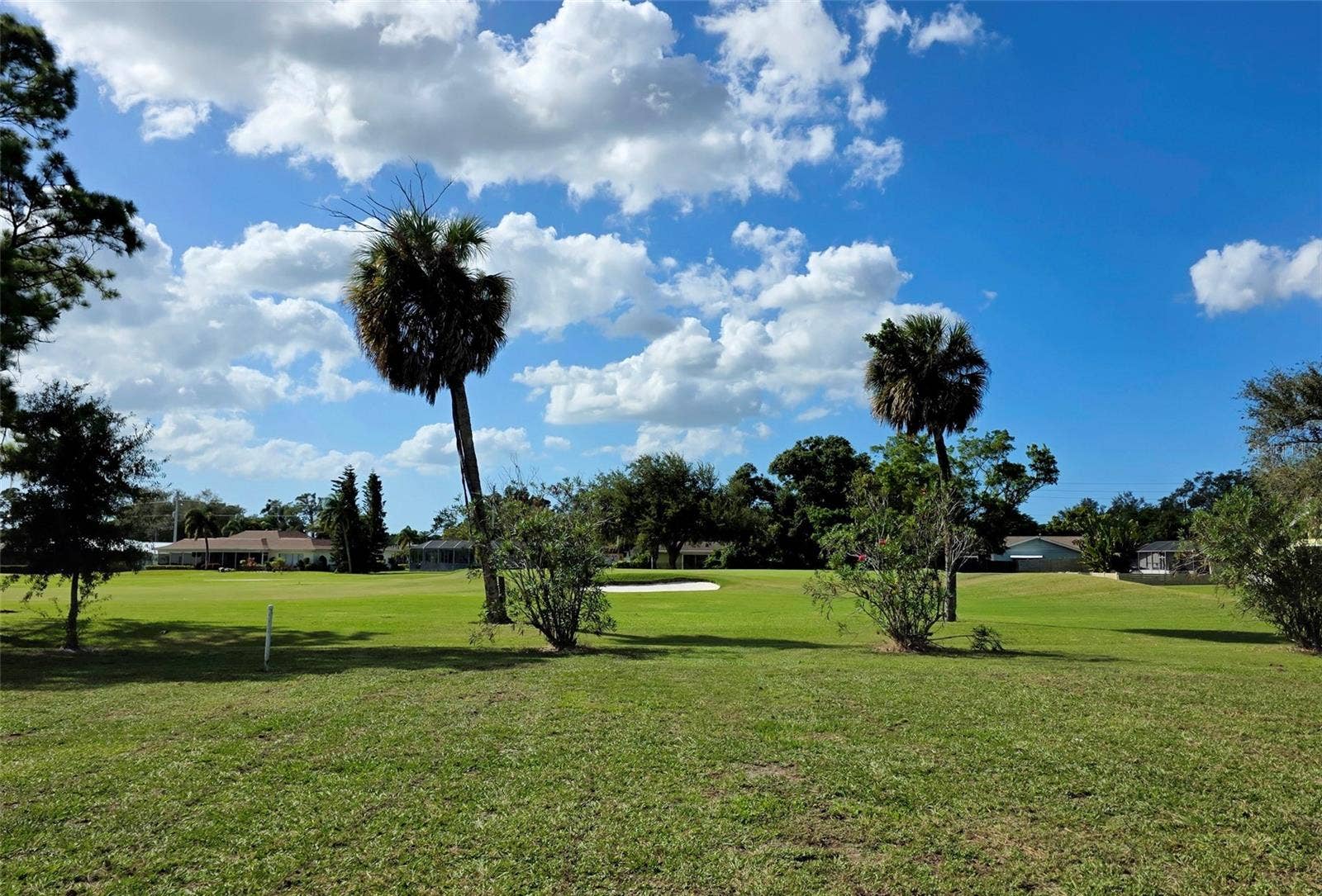 714 MAGELLAN DRIVE, Sarasota, FL 34243 Yard and Golf Course views 3