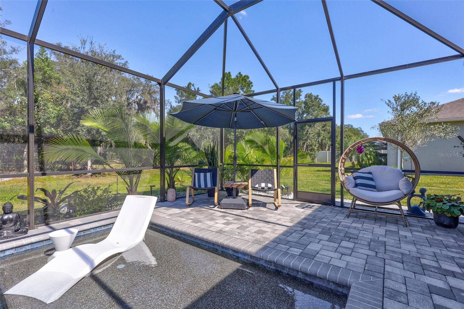 You'll Love the Expansive covered and open living in the lanai!  Facing the perfect direction for Shade and Sun!