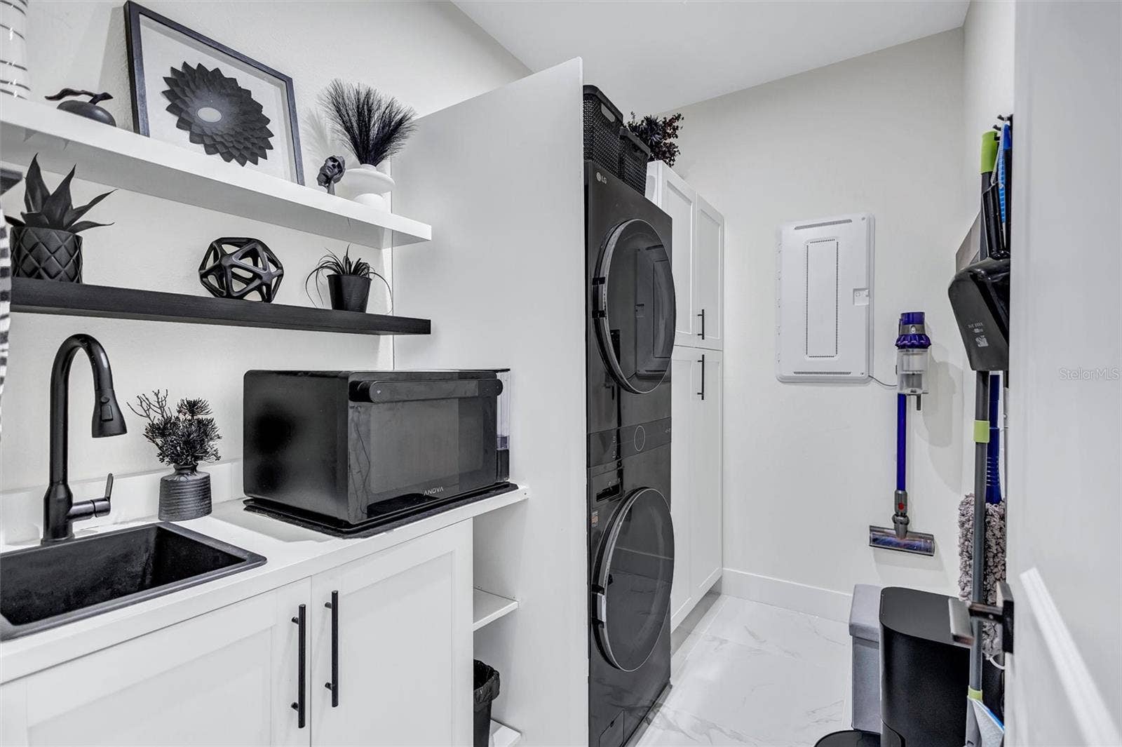 Custom Laundry with Utility Sink and Plenty of Storage!