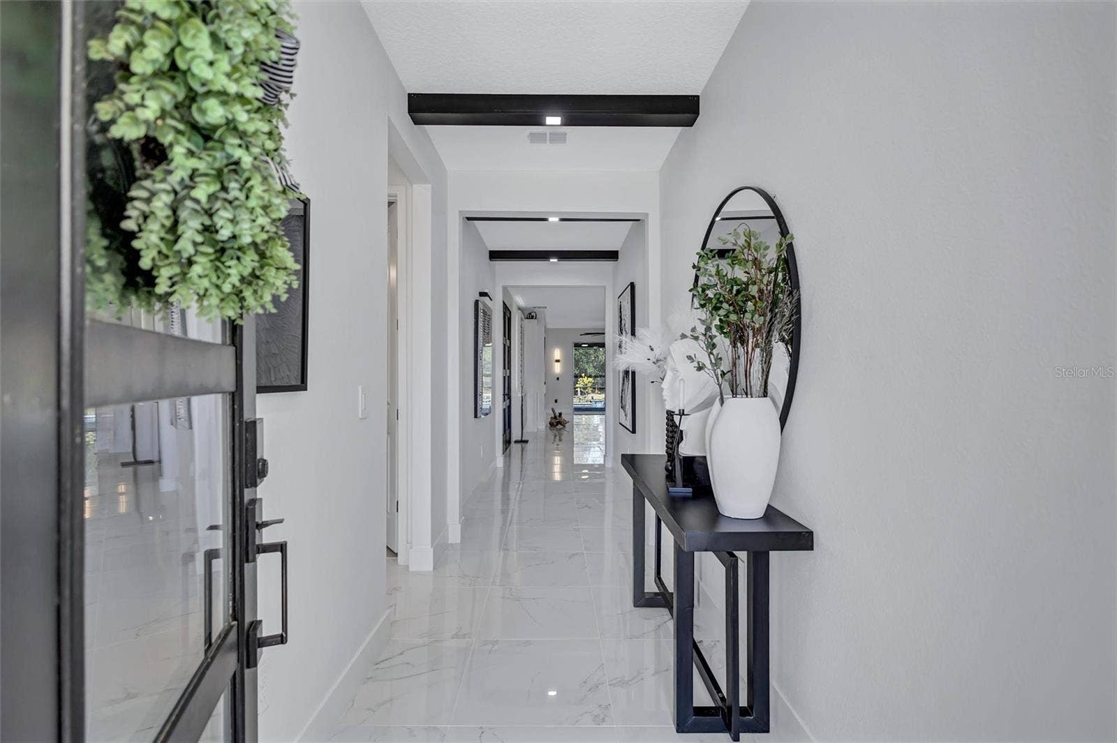 Beautiful Entryway with Upgraded Ceiling Beams