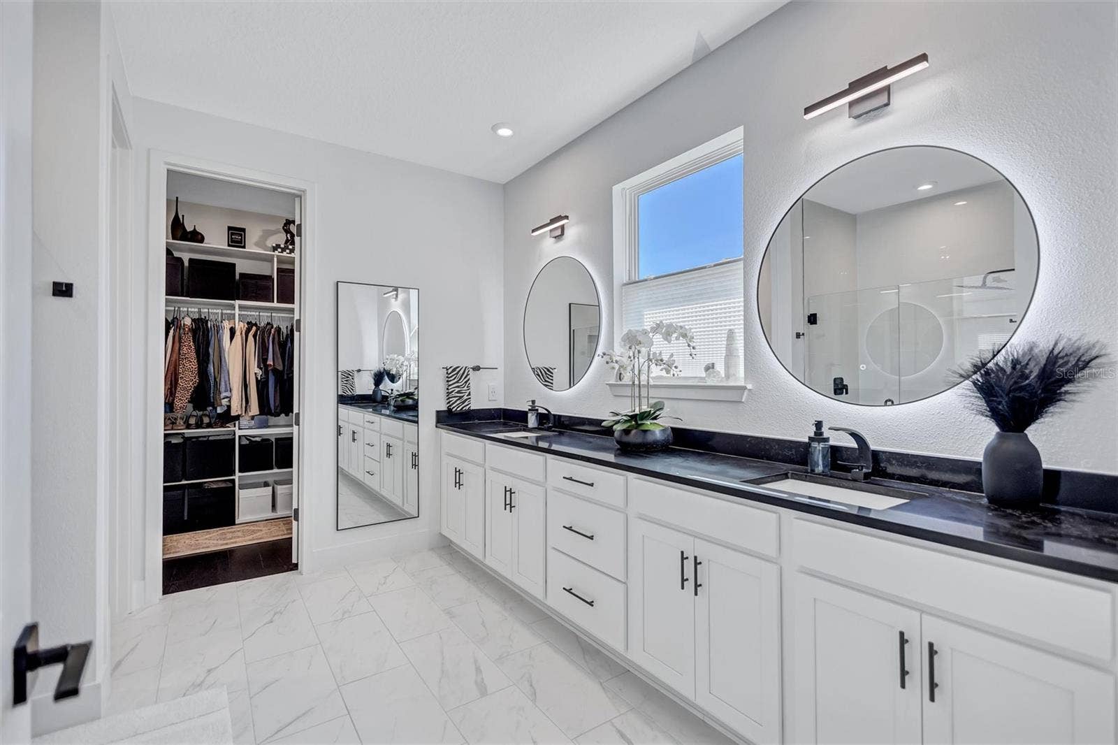 Gorgeous Primary - Main Bath!   Beautiful!  Lighting, Mirrors, Fixtures, Storage - Upgrades Throughout!