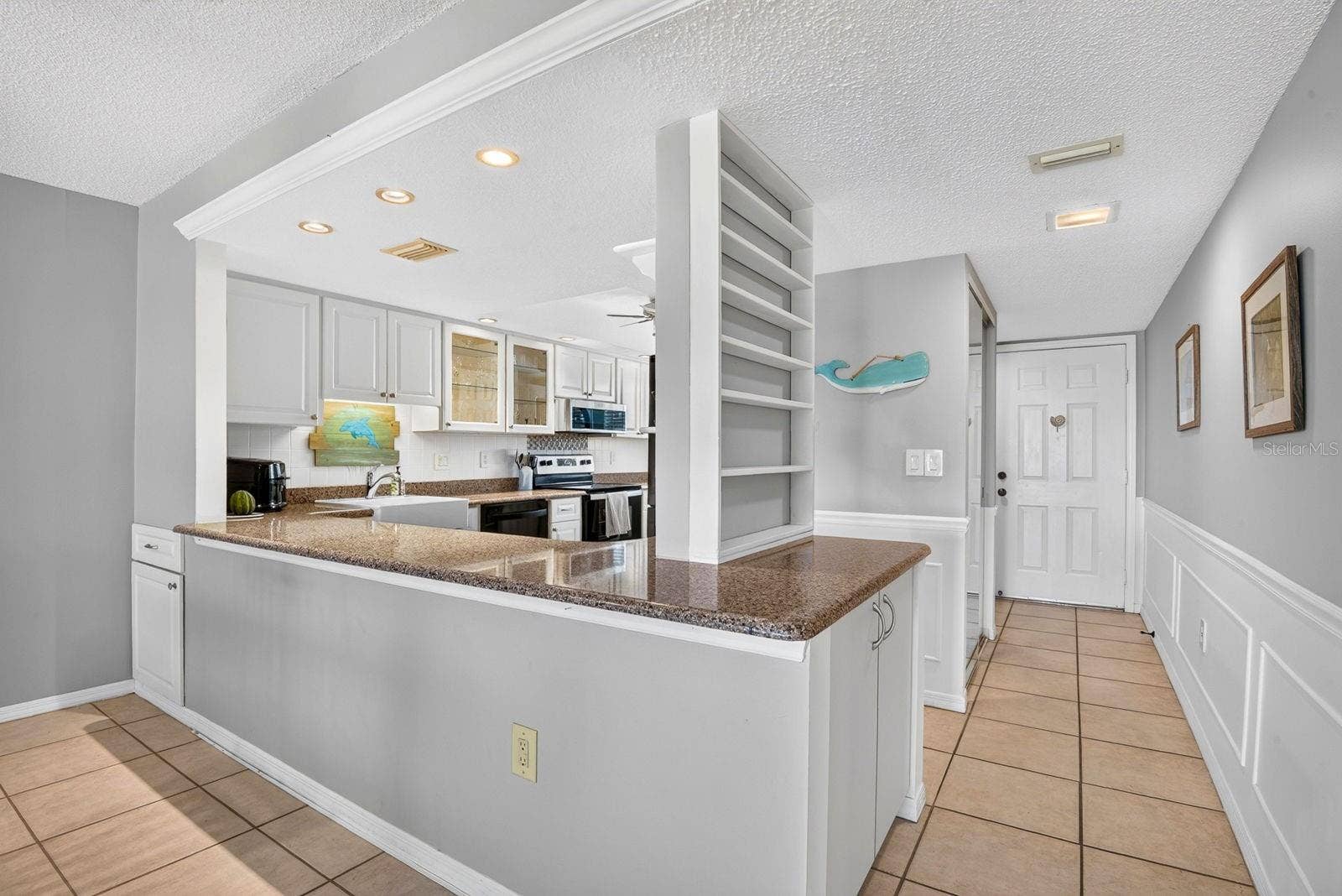 4745 INDEPENDENCE DRIVE, #4745, Bradenton, FL 34210 Facing into kitchen and entry from hallway