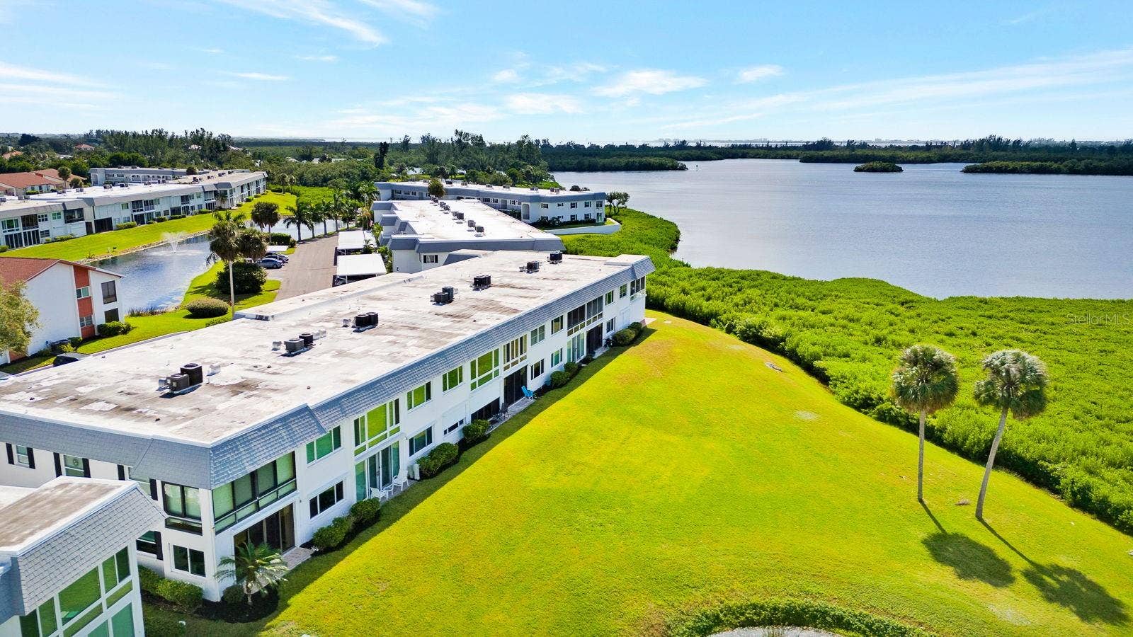 4745 INDEPENDENCE DRIVE, #4745, Bradenton, FL 34210 Aerial view of condo and water