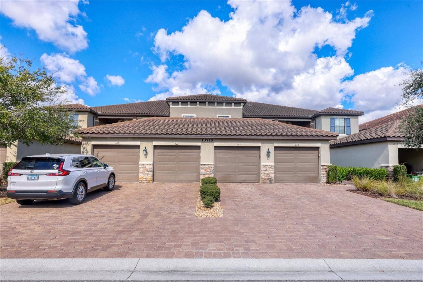 13719 MESSINA LOOP, #202, Lakewood Ranch, FL 34211 1 car garage and parking driveway