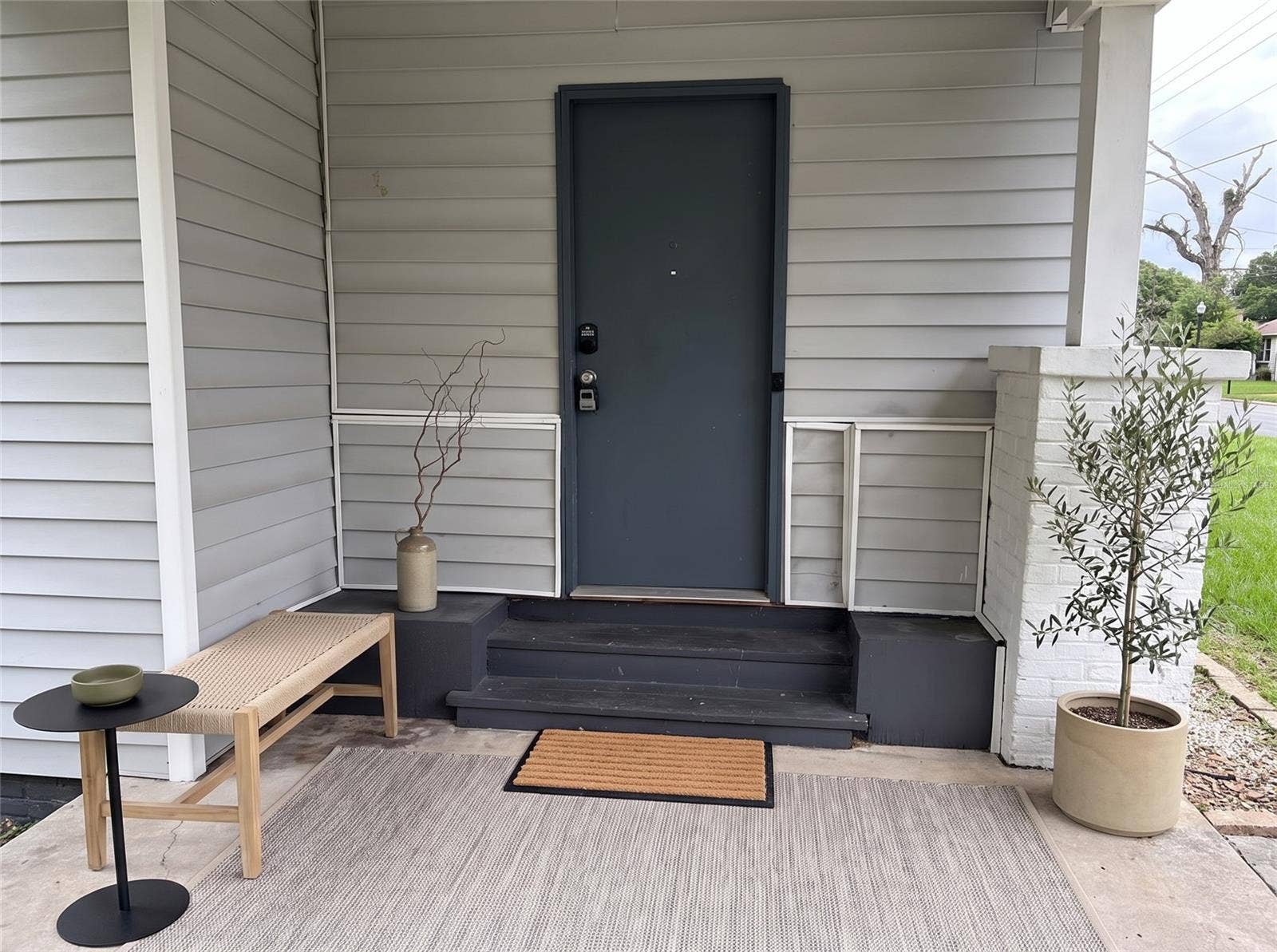 1199 KING AVENUE, Lakeland, FL 33803 Front door from carport"Virtually staged"