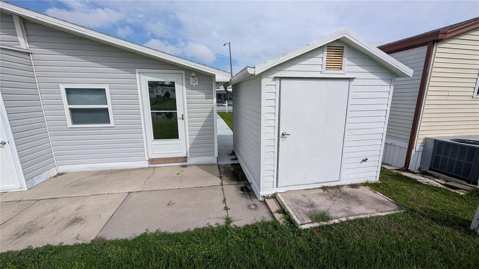 207 CITRUS RIDGE DRIVE, Davenport, FL 33837 SHED AND OPEN PATIO