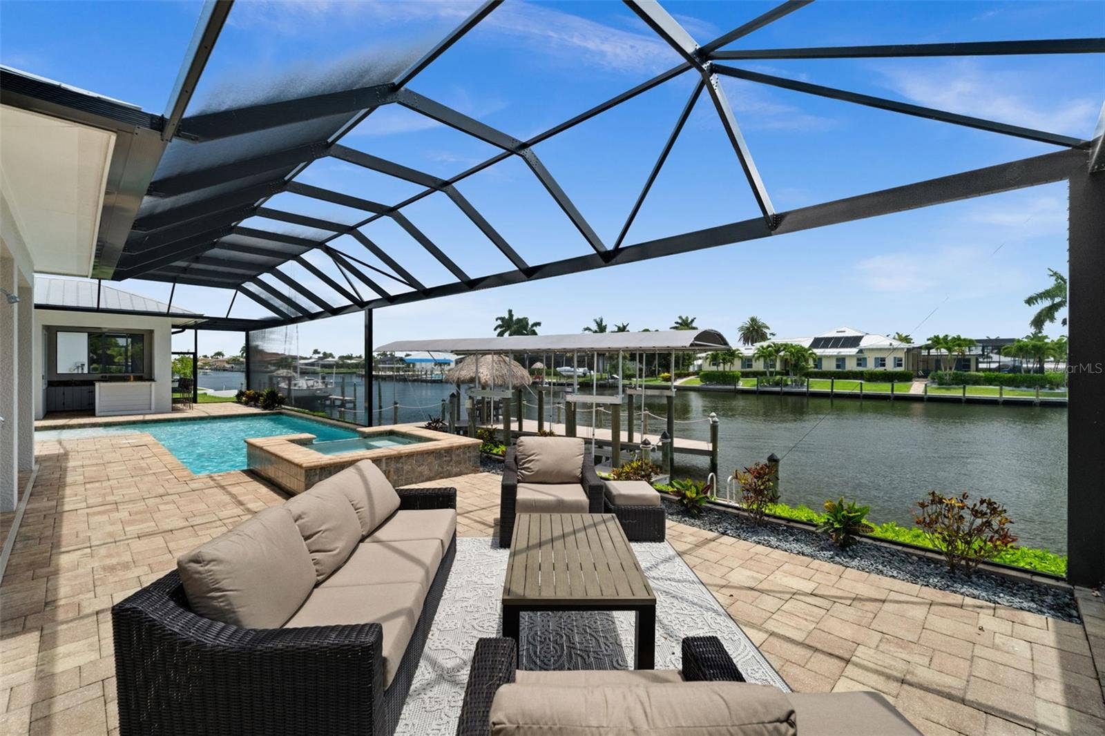 105 SW 52ND STREET, Cape Coral, FL 33914 Amazing views of the 200' wide San Carlos Canal