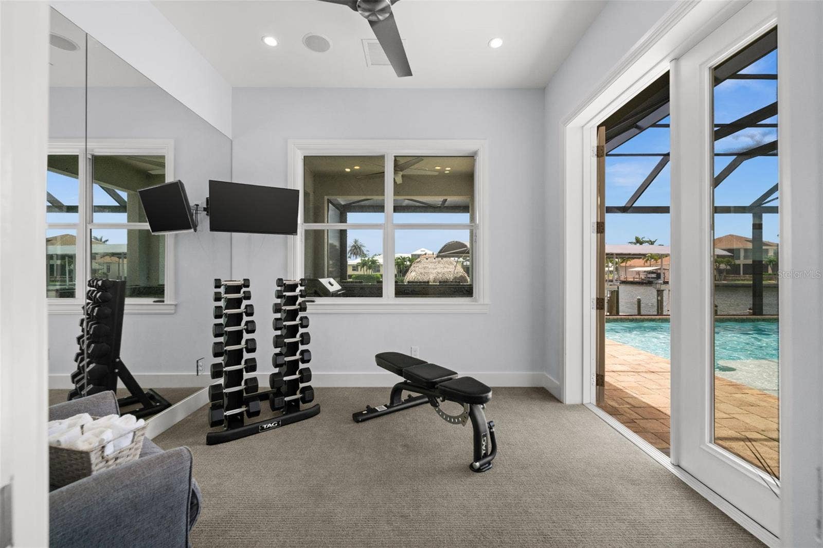 105 SW 52ND STREET, Cape Coral, FL 33914 Air conditioned dedicated workout room or office with direct access to the pool and lanai