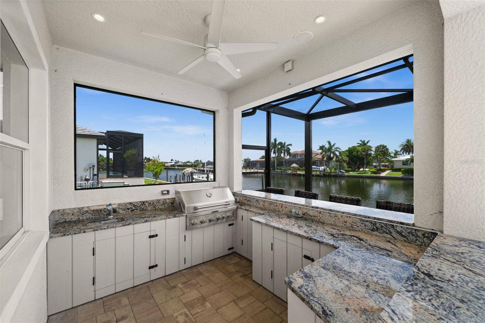 105 SW 52ND STREET, Cape Coral, FL 33914 Outdoor kitchen with built in propane grill