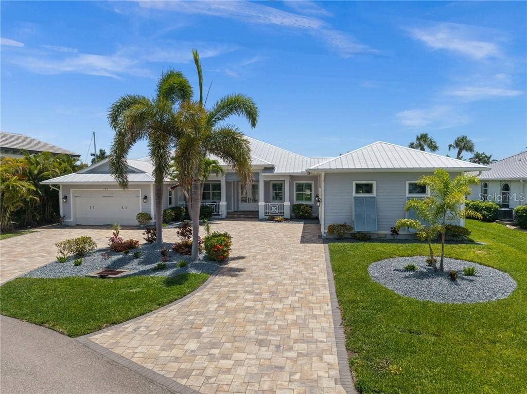 105 SW 52ND STREET, Cape Coral, FL 33914 Lots of pavers from the front to the back