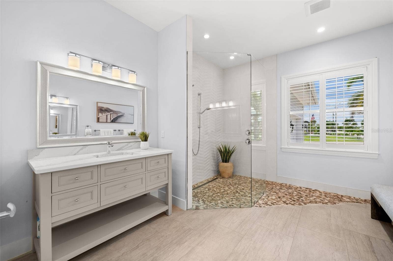 105 SW 52ND STREET, Cape Coral, FL 33914 Primary bath with custom tile and glass wet room