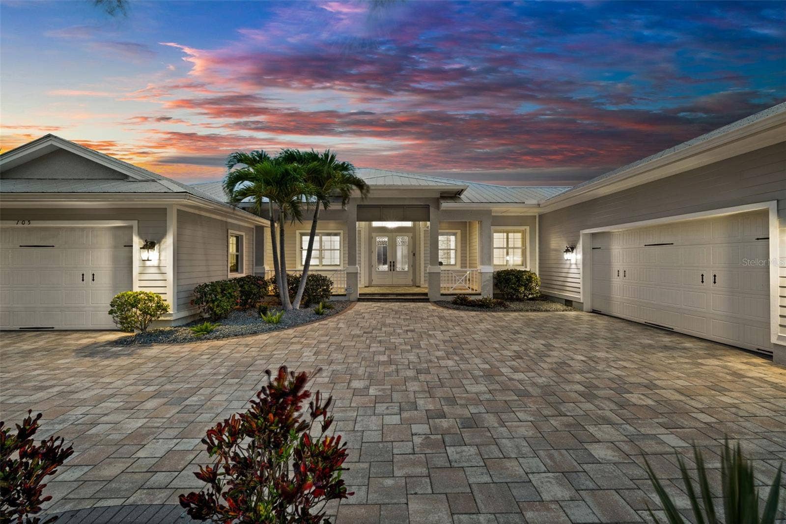 105 SW 52ND STREET, Cape Coral, FL 33914 The view as your guests pull up in the evening