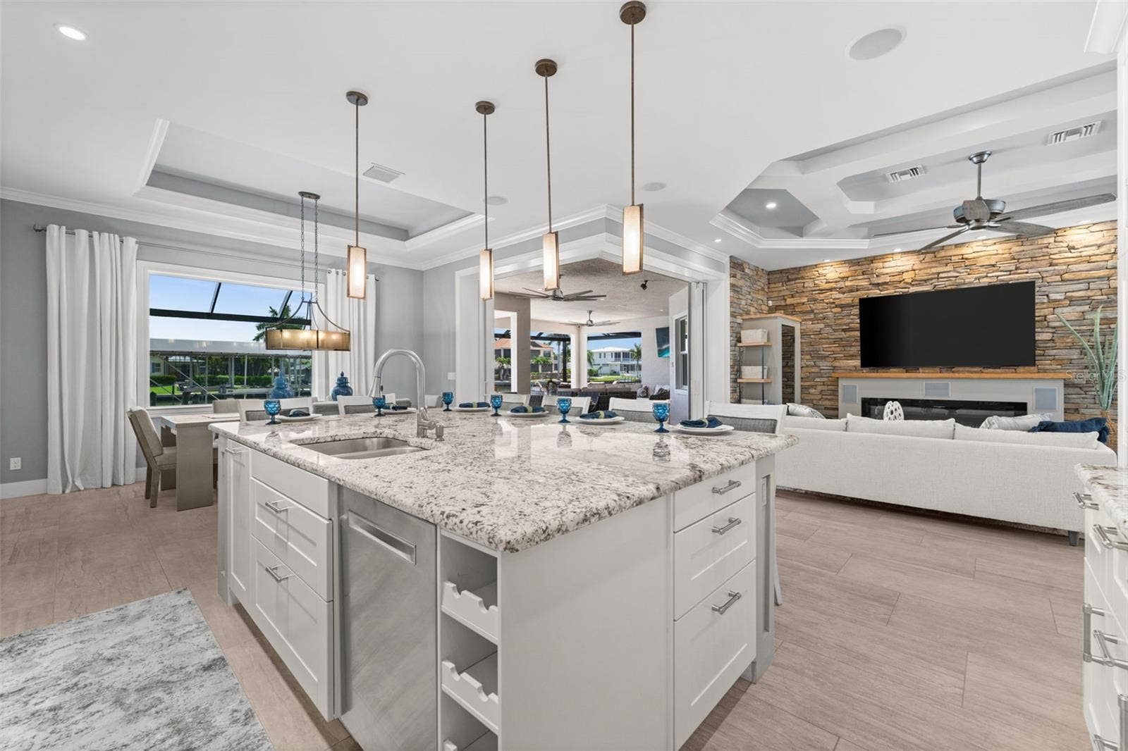 105 SW 52ND STREET, Cape Coral, FL 33914 Great views of the water from the kitchen through the 90 degree sliding doors