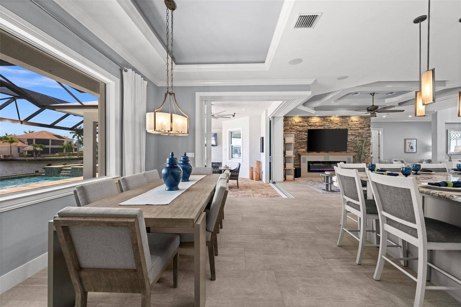 105 SW 52ND STREET, Cape Coral, FL 33914 Dining room just steps to the lanai through the 90 degree sliding doors