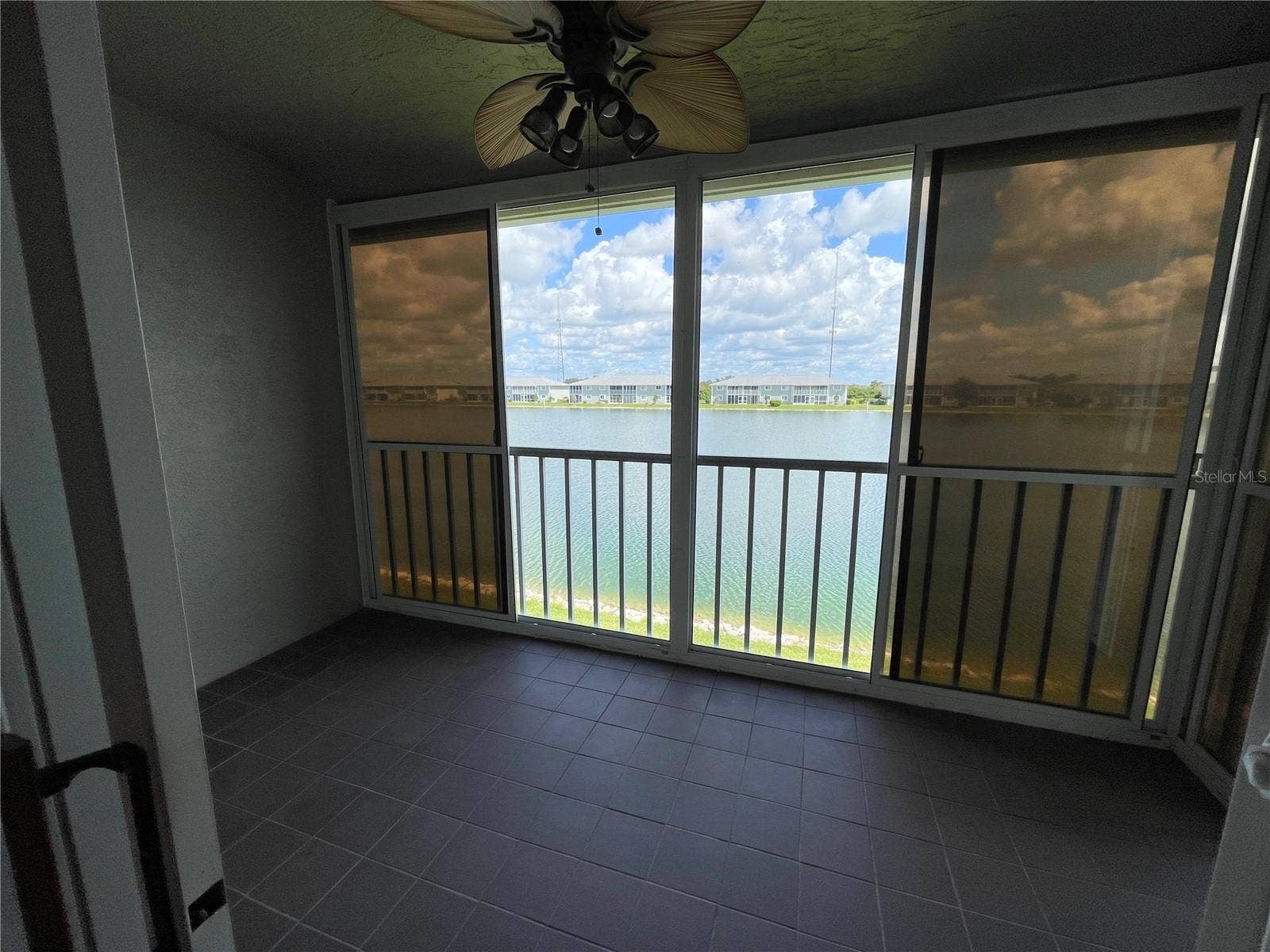 3310 LOVELAND BOULEVARD, #606, Punta Gorda, FL 33980 Balkony view with sliders