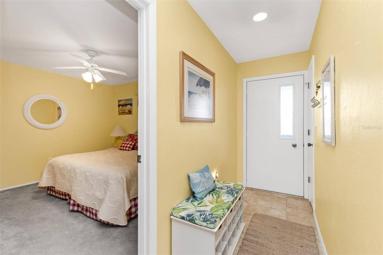 Thoughtfully separated from the primary suite, the front guest bedroom offers added privacy and a comfortable retreat for visiting family and friends.