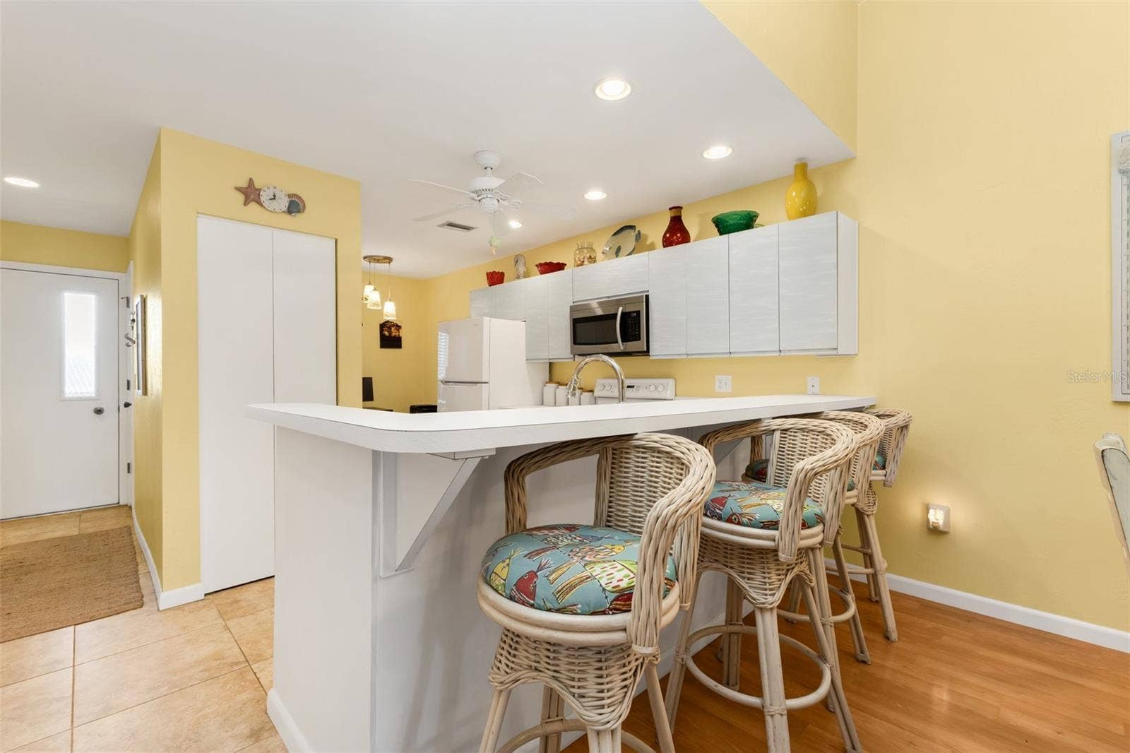 Pull up a stool for morning coffee, enjoy casual meals at the breakfast bar, or chat with friends while preparing dinner.