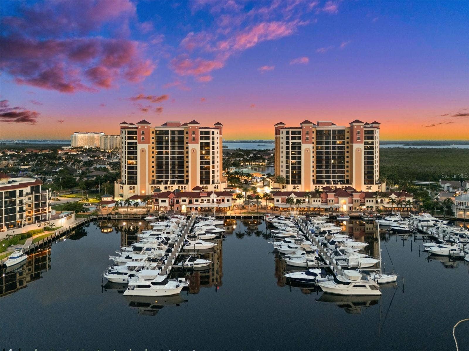 5626 CAPE HARBOUR DRIVE, #102, Cape Coral, FL 33914 Cape Harbour Marina in the Evening