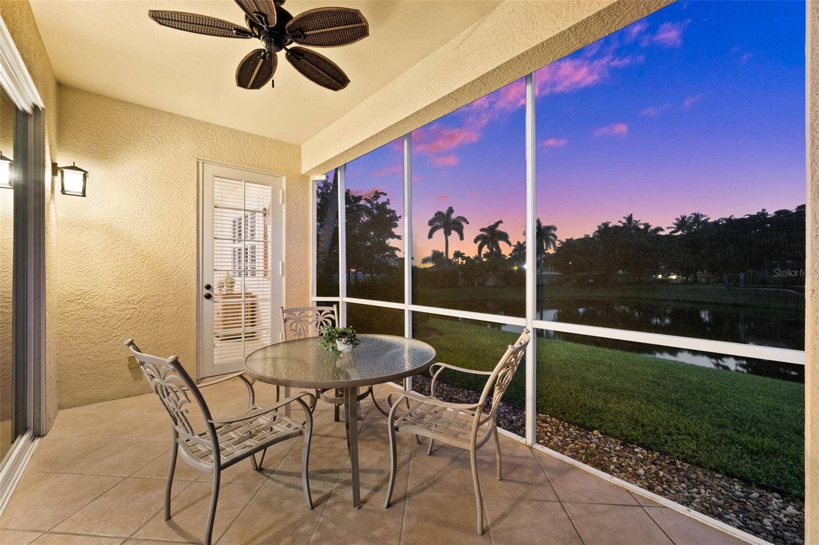 5626 CAPE HARBOUR DRIVE, #102, Cape Coral, FL 33914 Lanai in the Evening
