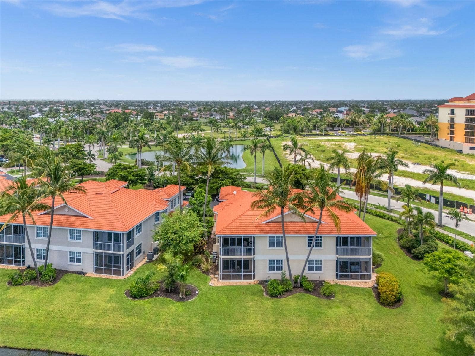 5626 CAPE HARBOUR DRIVE, #102, Cape Coral, FL 33914 Aerial View of the back