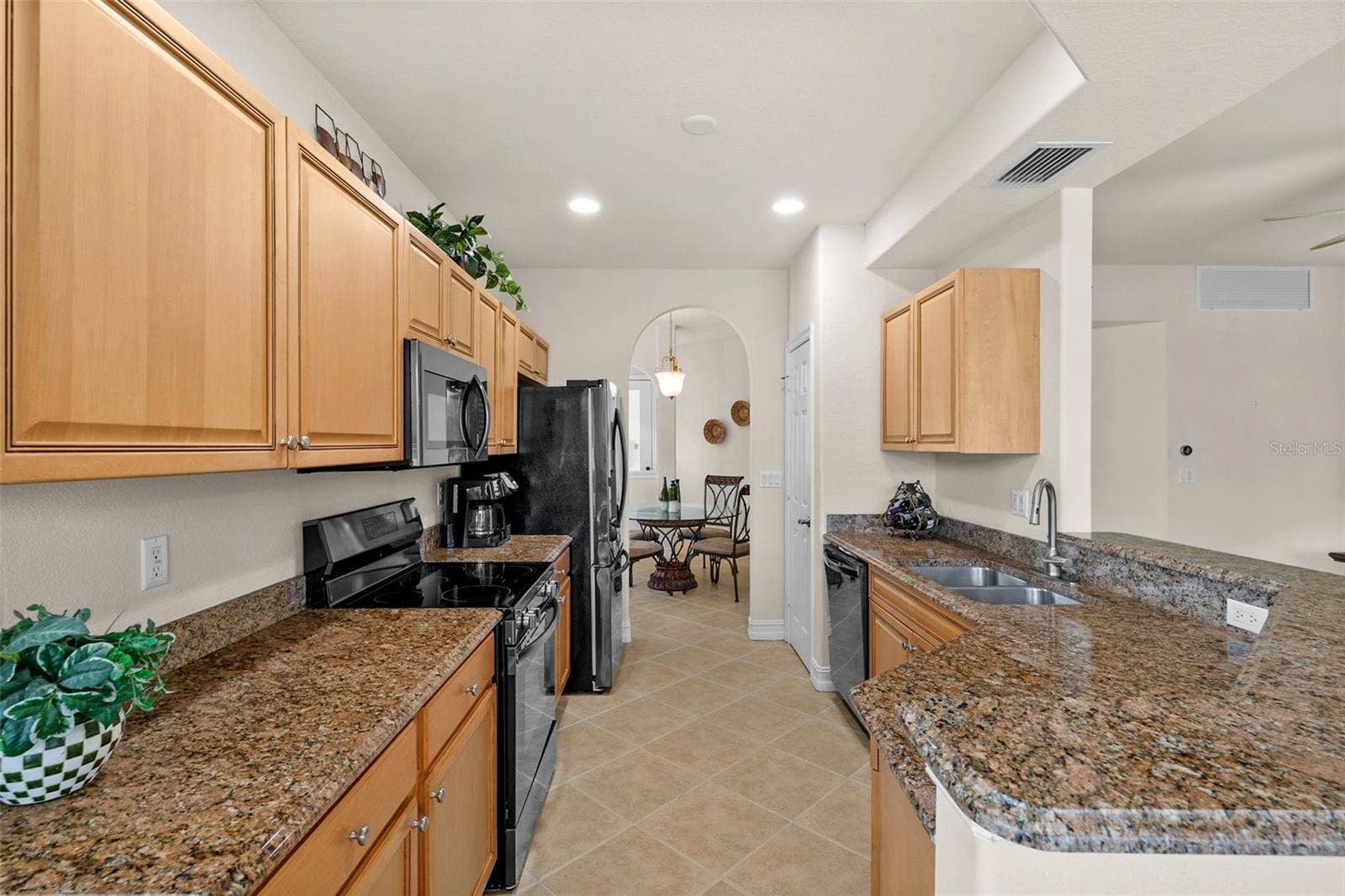 5626 CAPE HARBOUR DRIVE, #102, Cape Coral, FL 33914 Even a Breakfast Bar for Gatherings