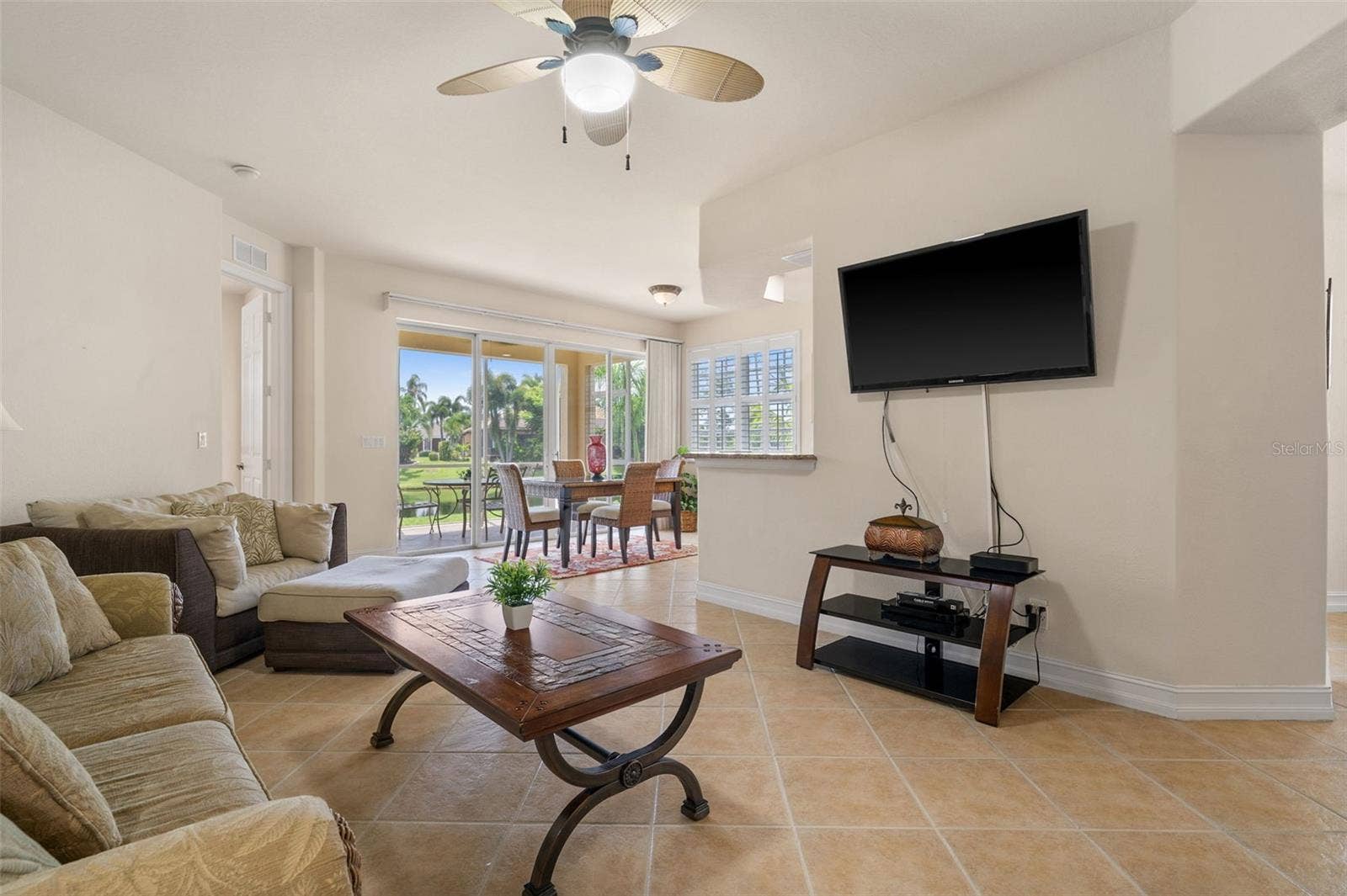 5626 CAPE HARBOUR DRIVE, #102, Cape Coral, FL 33914 Living Room with a View Outside