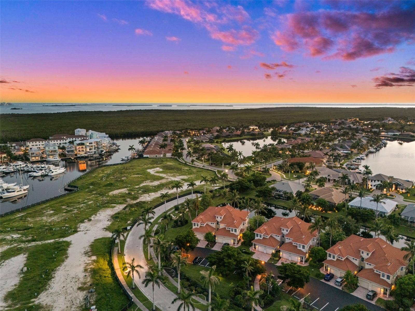 5626 CAPE HARBOUR DRIVE, #102, Cape Coral, FL 33914 Evening View of the Coach Houses