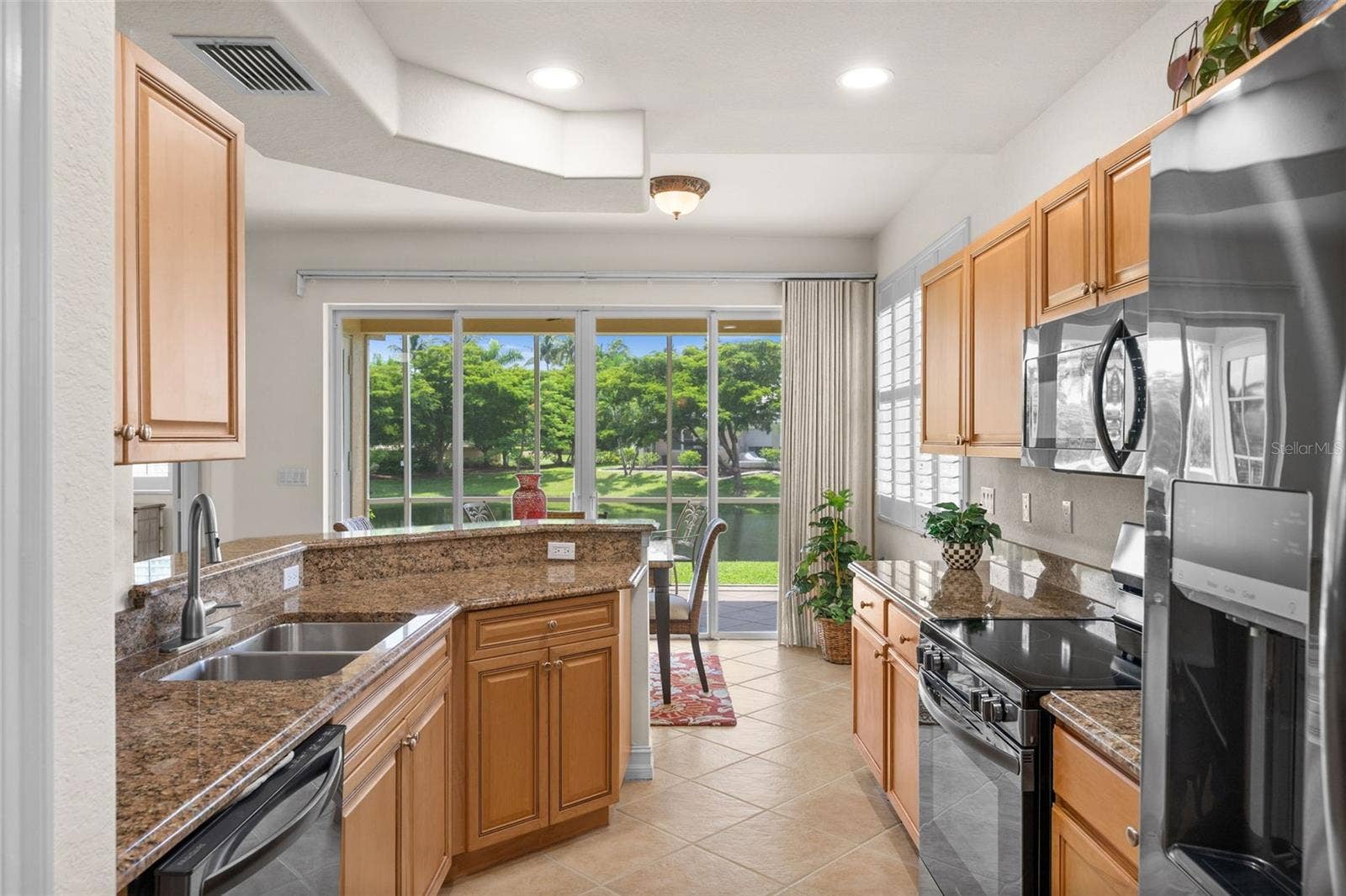 5626 CAPE HARBOUR DRIVE, #102, Cape Coral, FL 33914 Open Kitchen with Granite Countertops