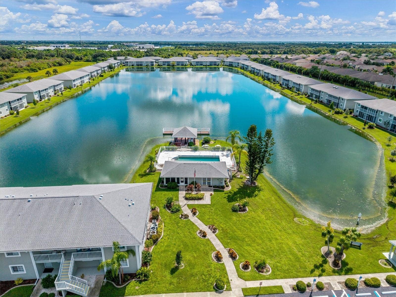 3310 LOVELAND BOULEVARD, #1105, Punta Gorda, FL 33980 WONDERFUL COMMUNITY CENTER WITH POOL/PAVILLION AND FISHING PIER