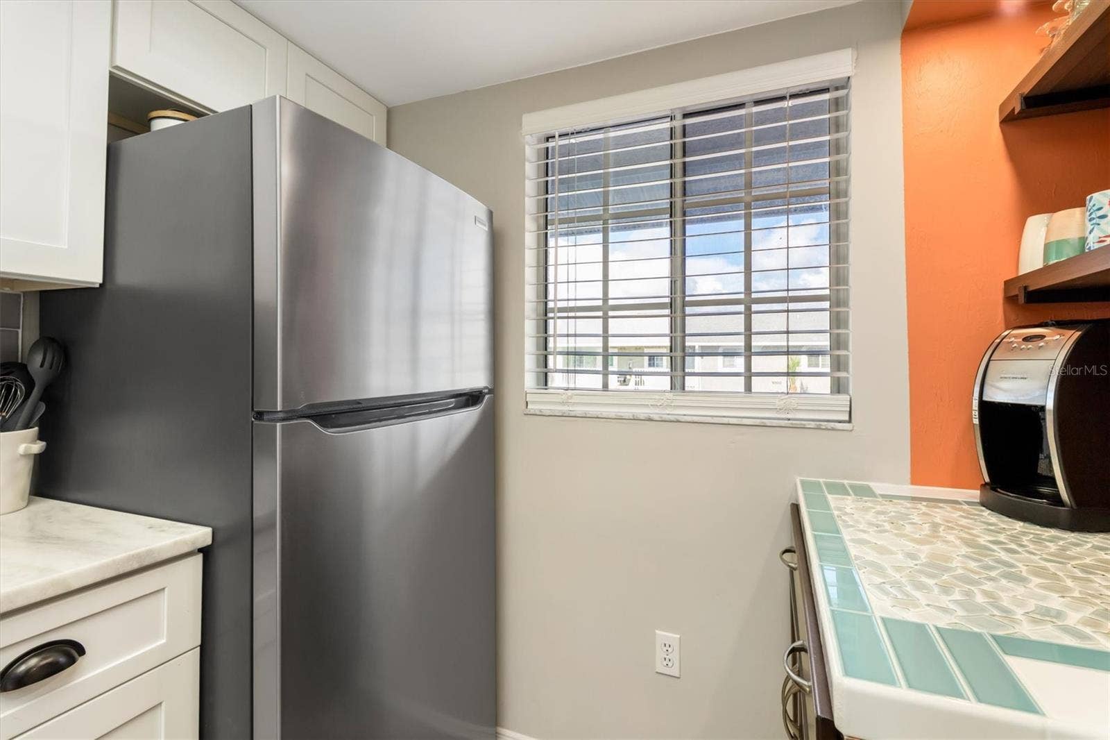 3310 LOVELAND BOULEVARD, #1105, Punta Gorda, FL 33980 COFFEE /BEVERAGE BAR WITH SEA GLASS TILE