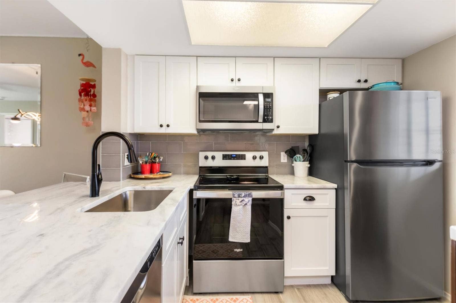 3310 LOVELAND BOULEVARD, #1105, Punta Gorda, FL 33980 STAINLESS APPLIANCE SUITE AND TOP TIER GRANITE