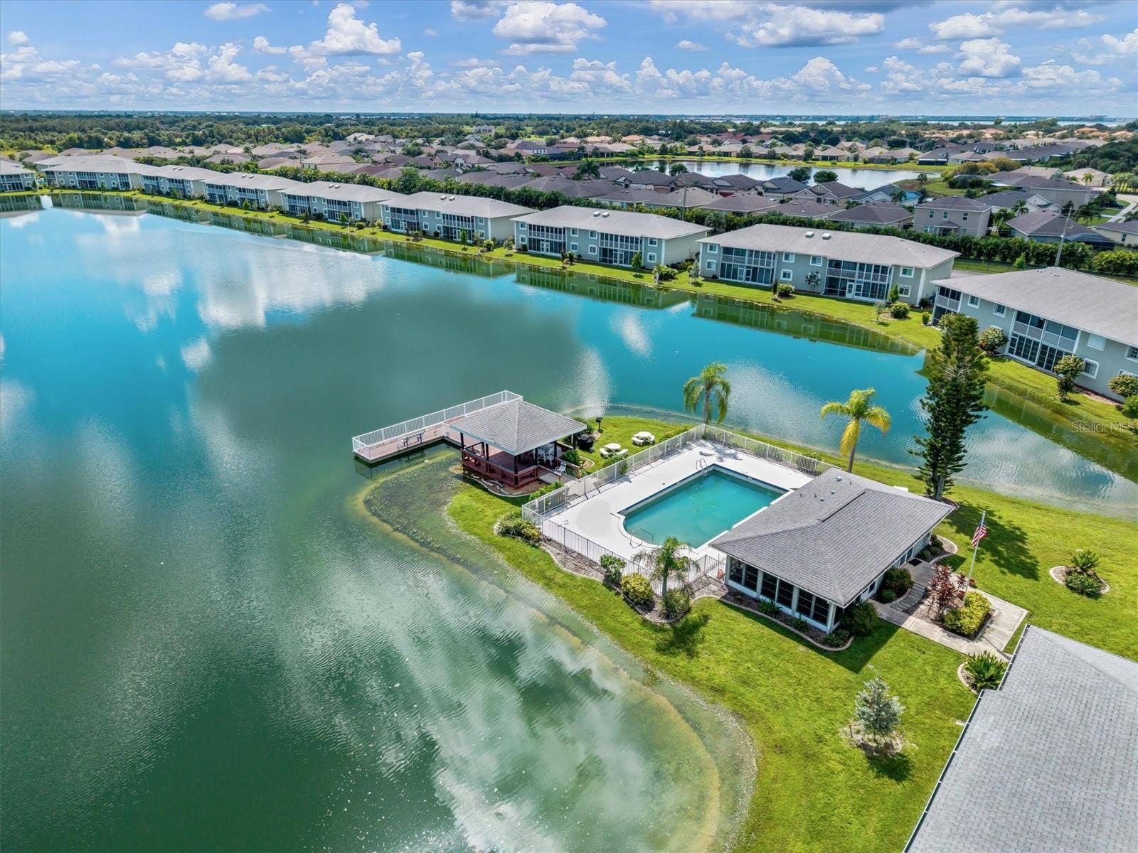 3310 LOVELAND BOULEVARD, #1105, Punta Gorda, FL 33980 LAKEFRONT COMMUNITY CENTER WITH POOL PAVILION AND FISHING PIER