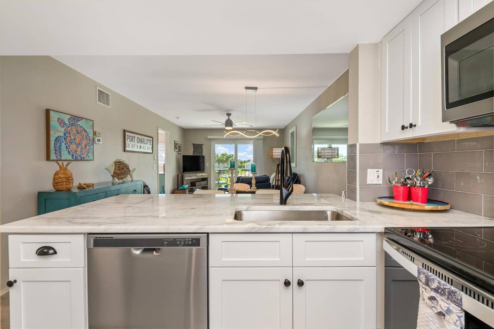 3310 LOVELAND BOULEVARD, #1105, Punta Gorda, FL 33980 SOFT CLOSE SOLID WOOD CABINETS AND ON TREND HARDWARE