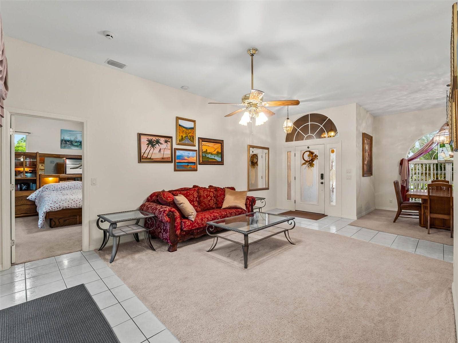 LivingRoom_9336StPaulDr_PortCharlotte_FoyerView_Corner.jpg