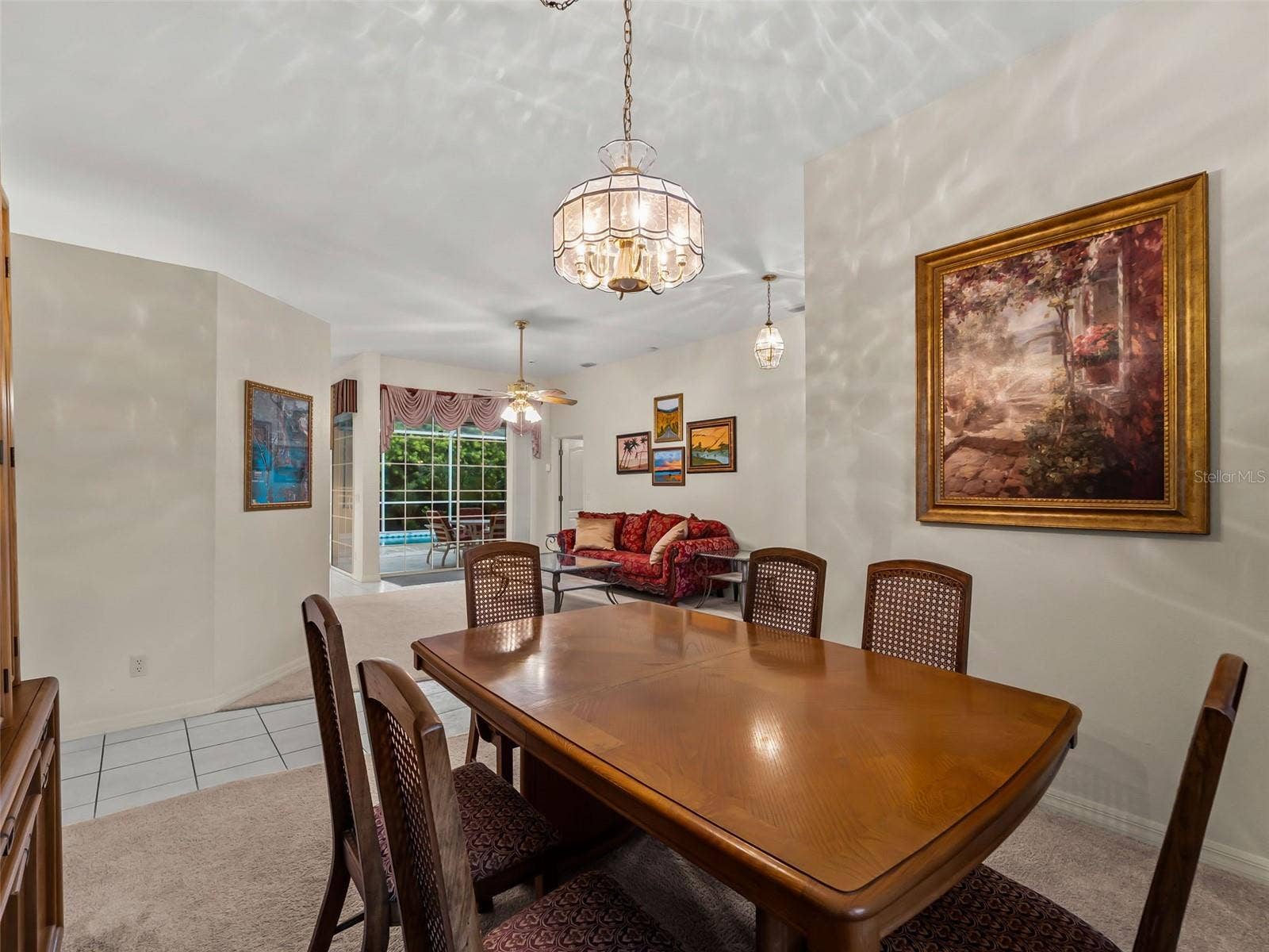 DiningRoom_9336StPaulDr_PortCharlotte_Chandelier_Corner.jpg