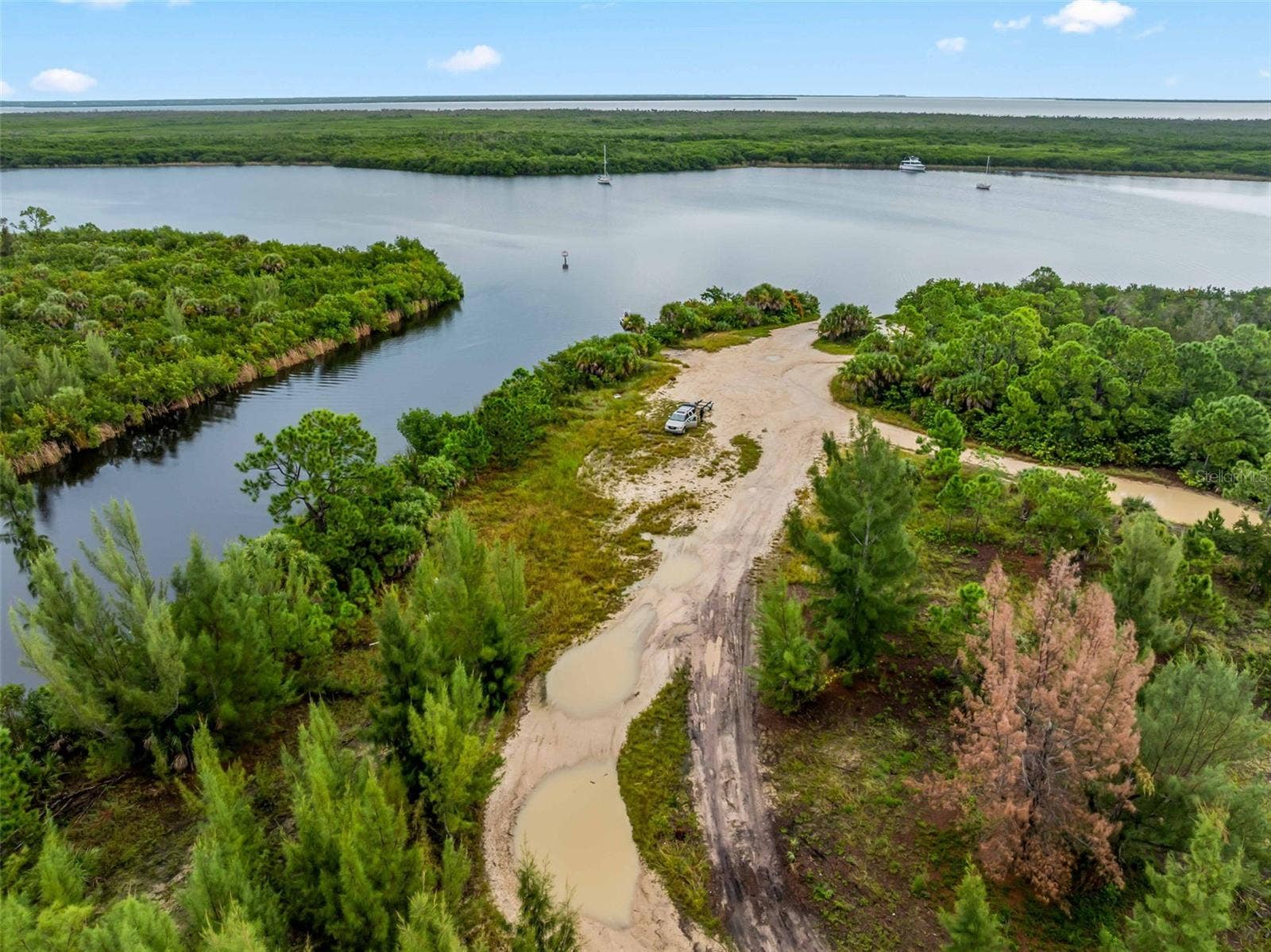 Aerial_9336StPaulDr_PortCharlotte_NearbyWaterway_Wide.jpg