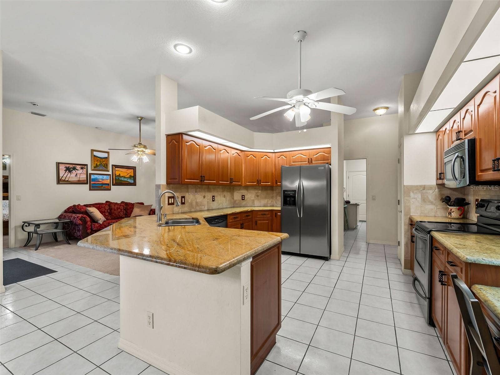 Kitchen_9336StPaulDr_PortCharlotte_StainlessAppliances_Wide.jpg