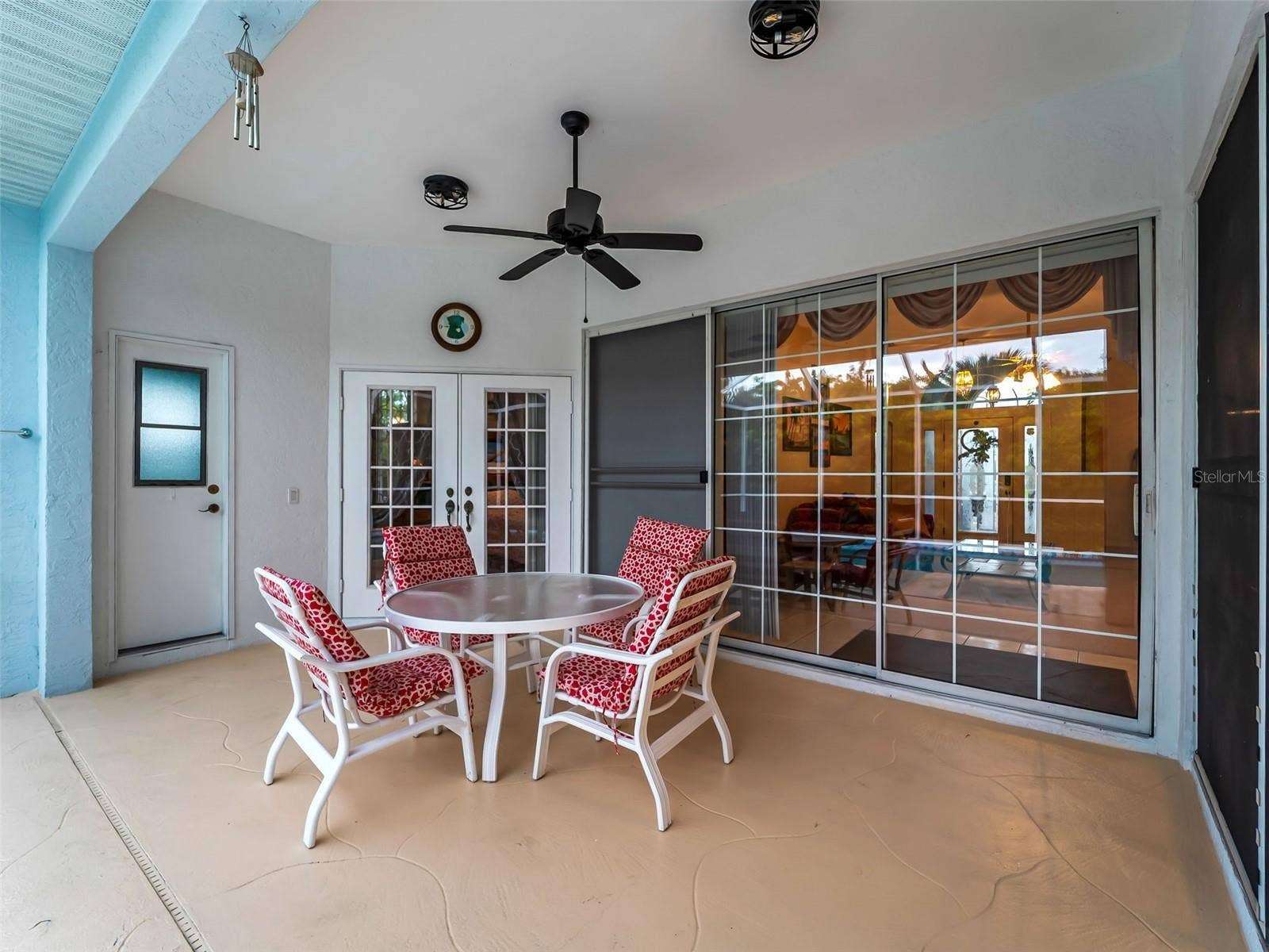 ScreenedLanai_9336StPaulDr_PortCharlotte_FrenchDoors_Wide.jpg