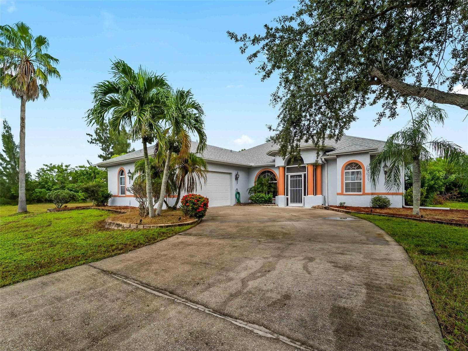 FrontExterior_9336StPaulDr_PortCharlotte_CurbAppeal_Wide2.jpg