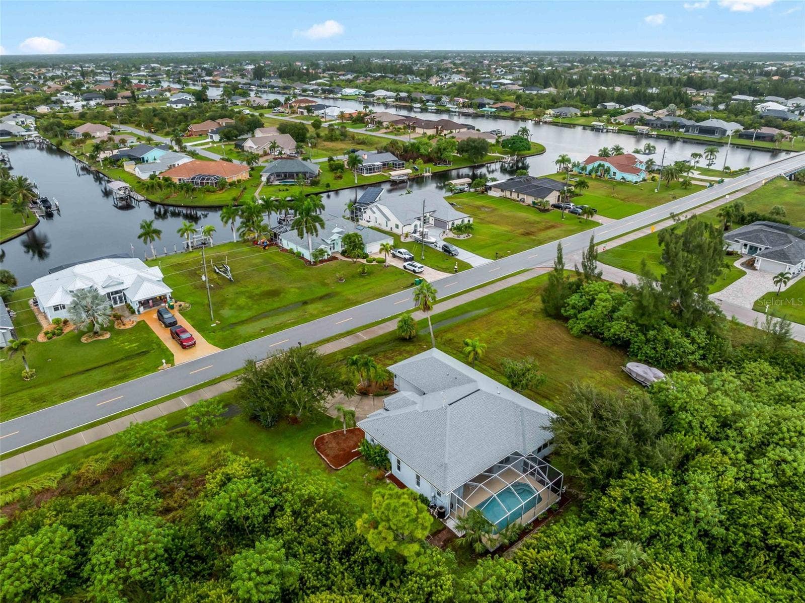 Aerial_9336StPaulDr_PortCharlotte_Neighborhood_Wide.jpg