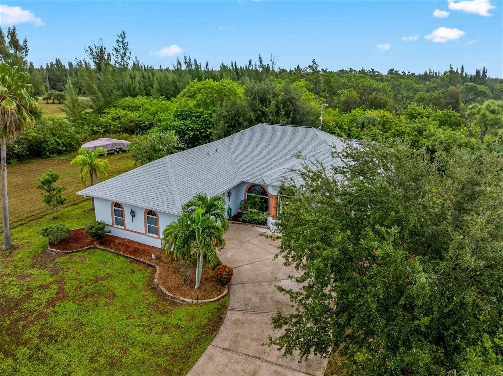 Aerial_9336StPaulDr_PortCharlotte_CurbAppeal_Daylight.jpg