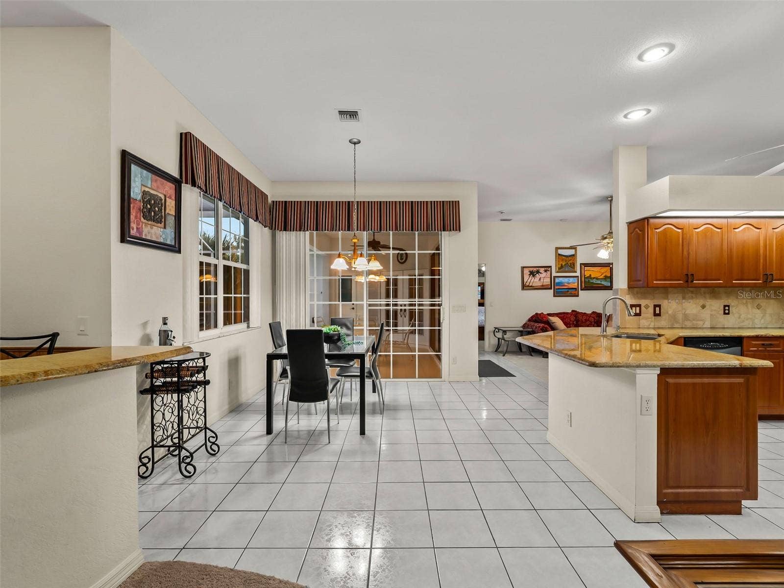 KitchenBreakfastNook_9336StPaulDr_PortCharlotte_OpenConcept_Corner.jpg