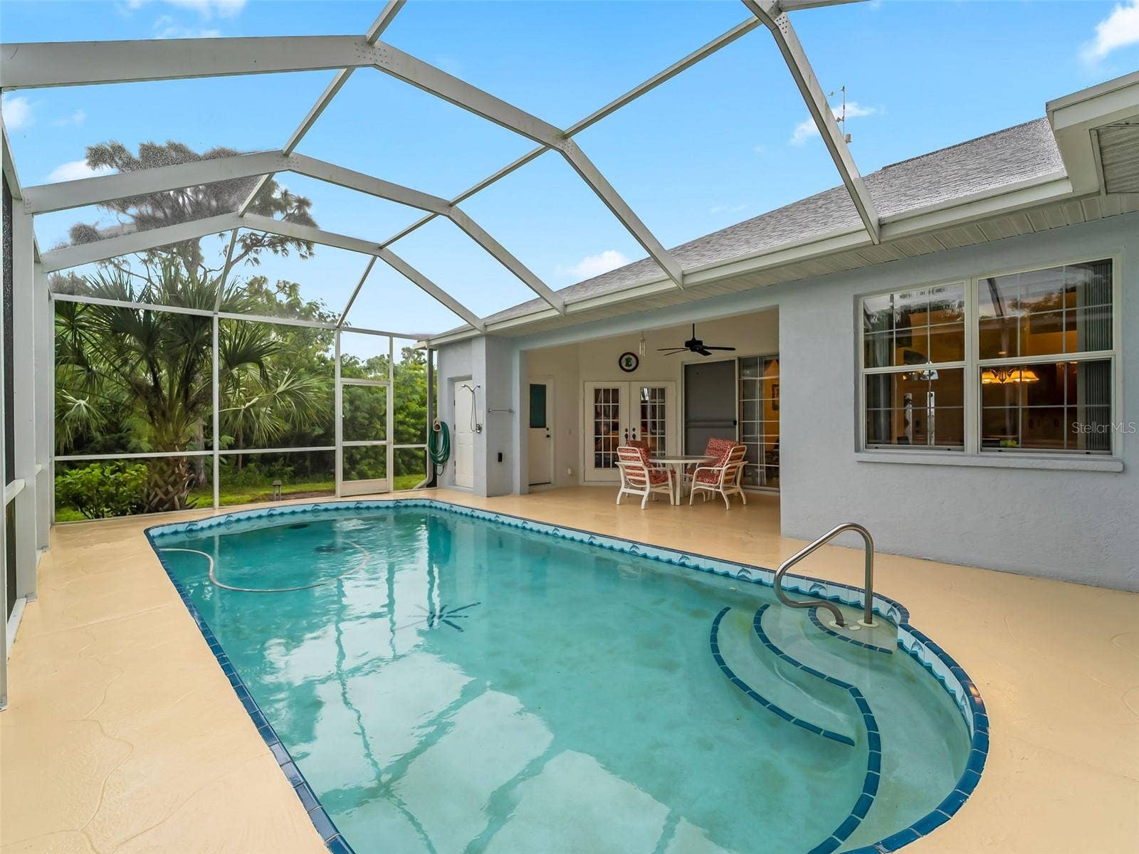 Pool_9336StPaulDr_PortCharlotte_ScreenEnclosure_LanaiView.jpg