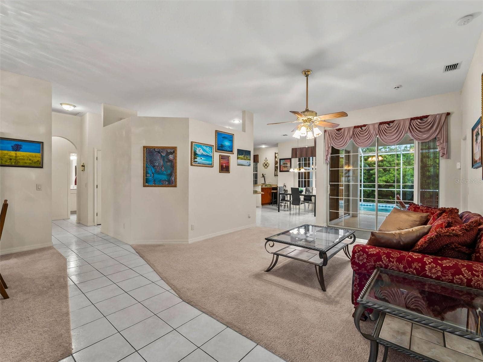 LivingRoom_9336StPaulDr_PortCharlotte_OpenConcept_Corner.jpg